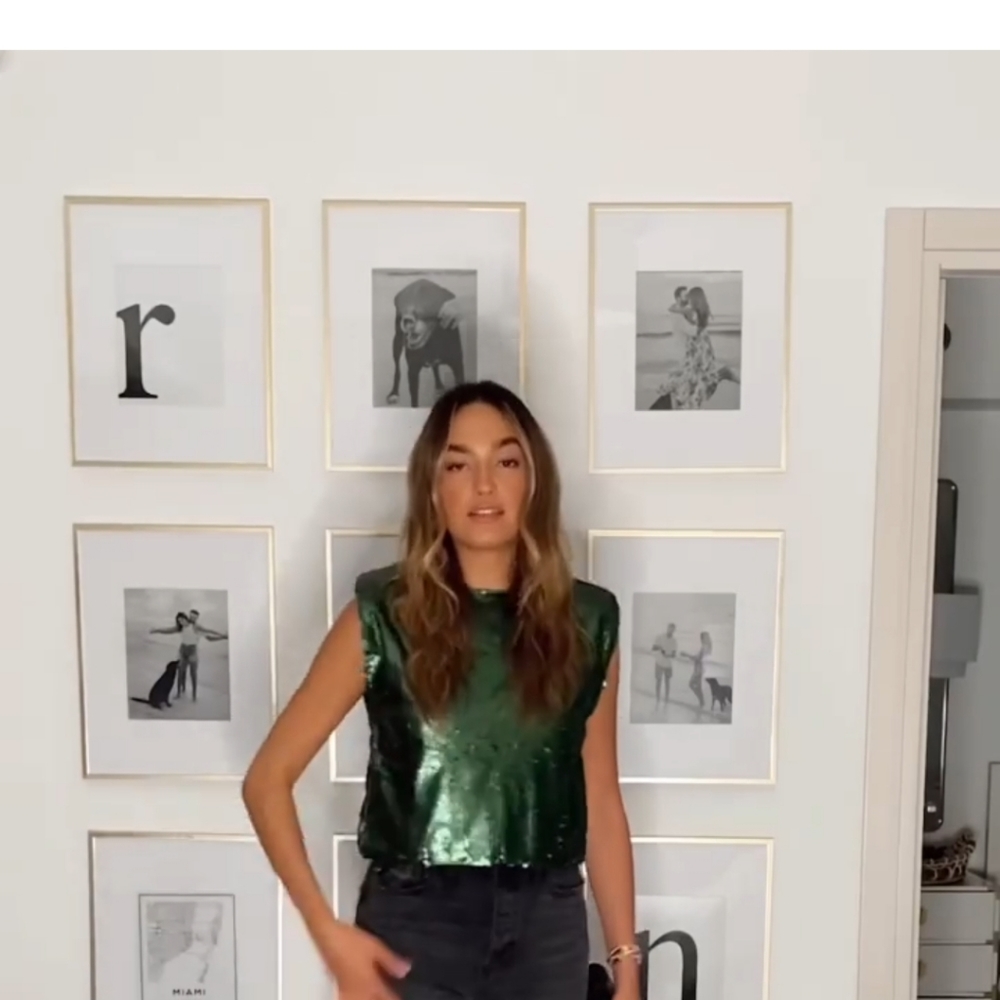 Padded shoulder sequin blouse